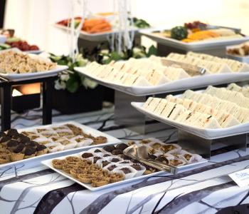 Assorted finger sandwiches and desserts